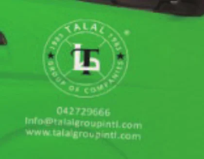 Talal Market: Door emblem and contact